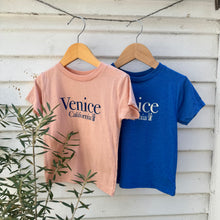 Load image into Gallery viewer, pink youth tee shirt with Venice California on front in blue and blue youth tee shirt with same words in white