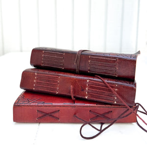 'We'll All Become Stories" Leather Journal