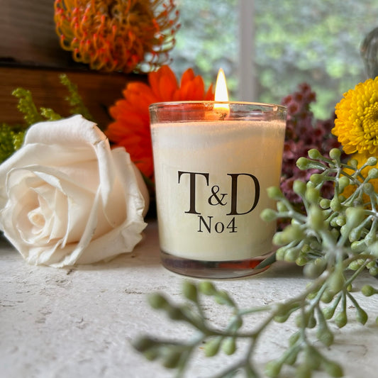 clear glass votive with clear label logo