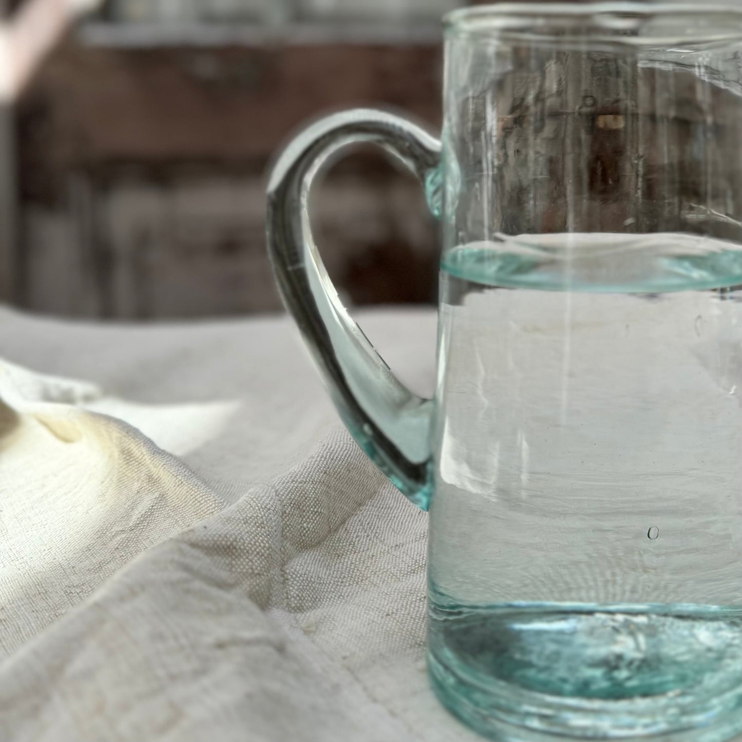 lightly green tinted recycled Moroccan glass pitcher