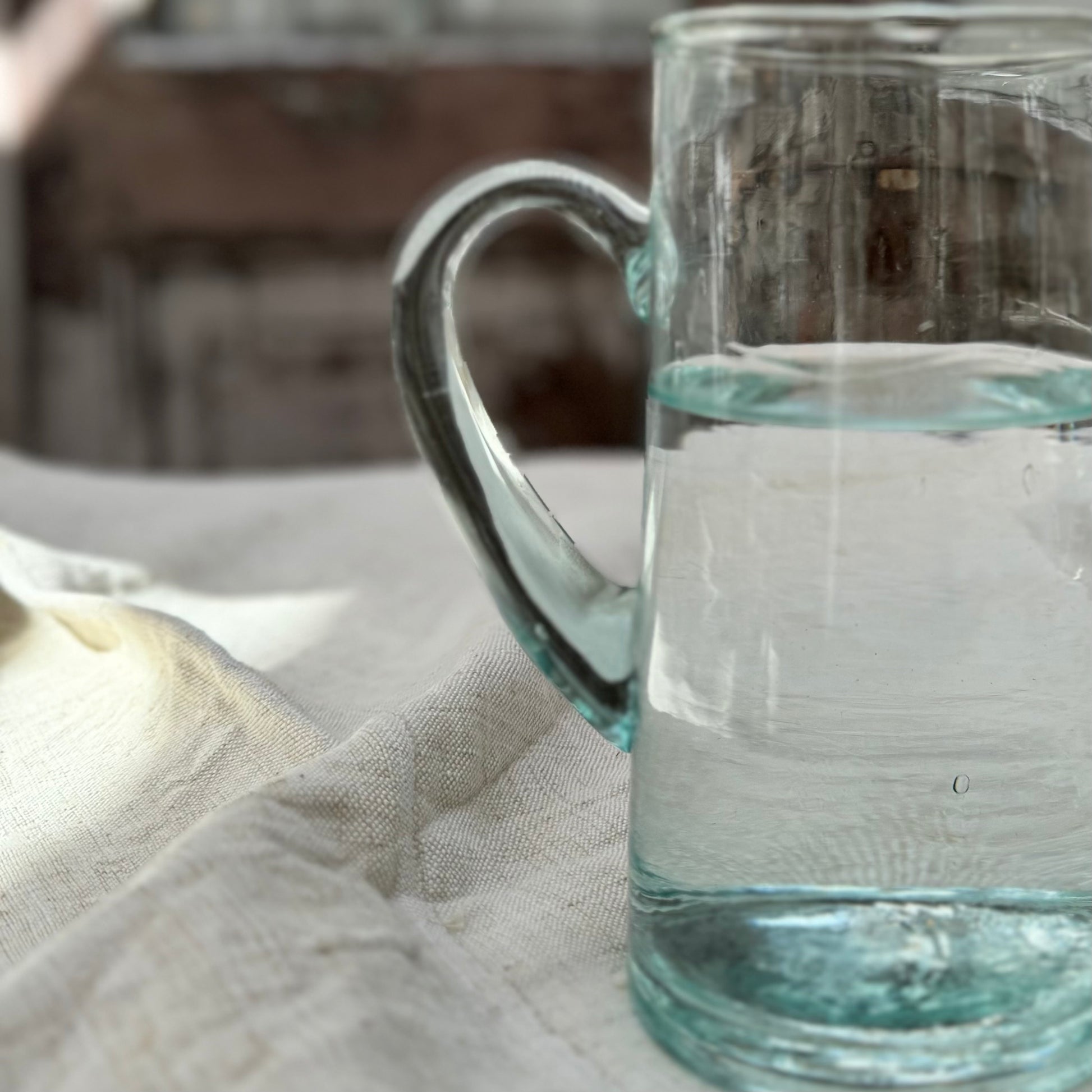 lightly green tinted recycled Moroccan glass pitcher