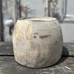 hand carved rounded wood vessel