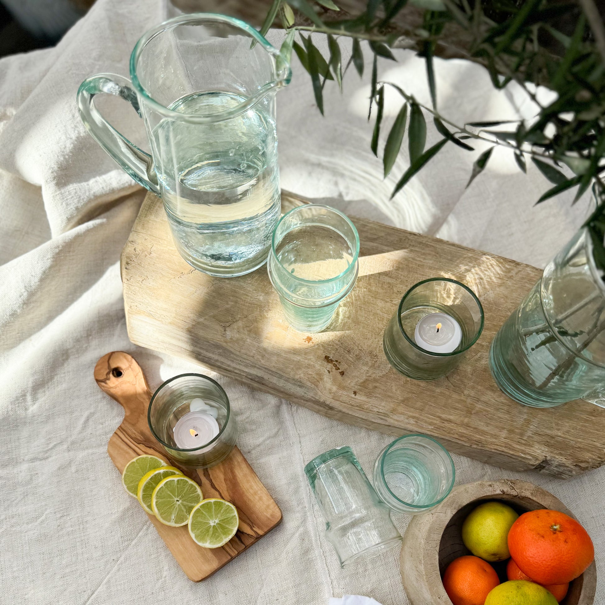 lightly green tinted recycled Moroccan glass tumbler with holding rim