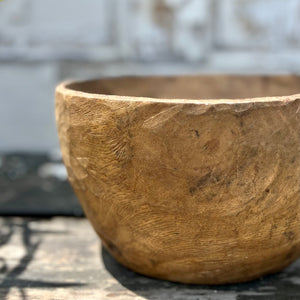 rustic hand carved wood bowl with handle on one side