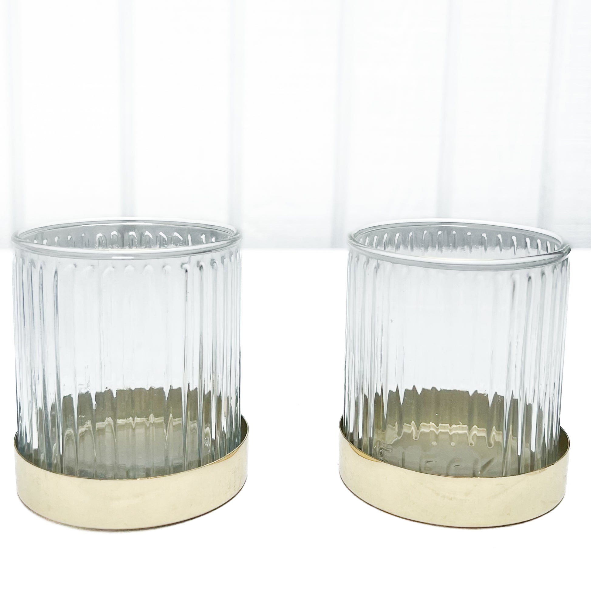 fluted glass candle votive with brass base