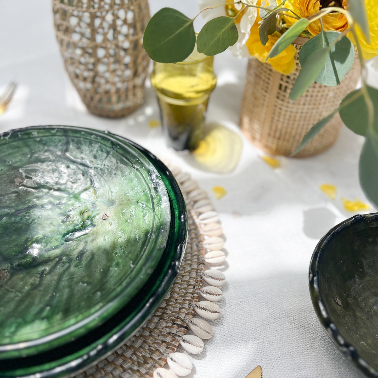 rustic ceramic handmade bowl in varying shapes and sizes with green glaze