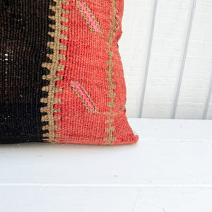 salmon red, brown and black colored Turkish rug pillow