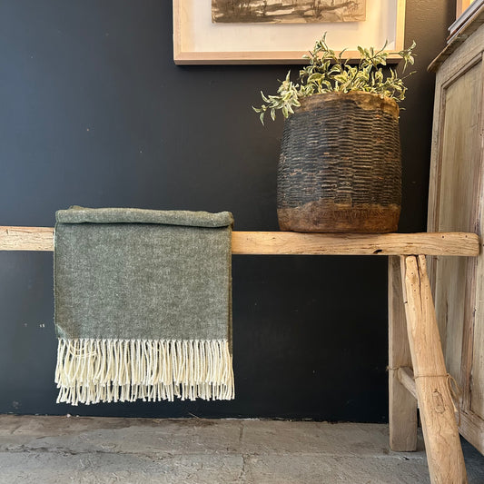 forest green herringbone throw with cream colored fringe
