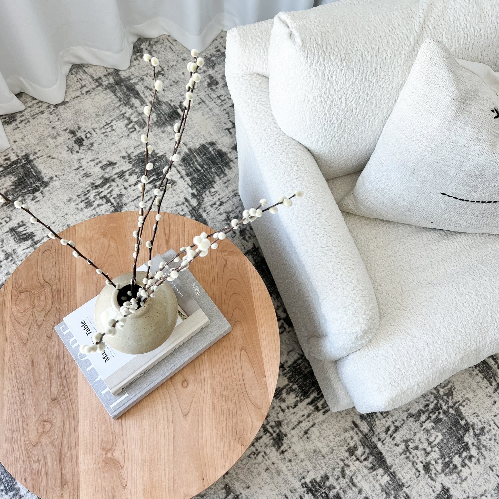 round side table with open middle and quarter round detailing on sides