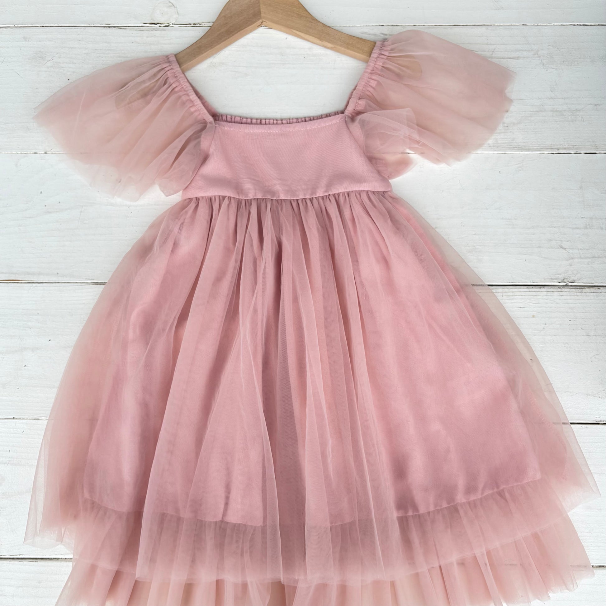 girl's pink dress with tool skirt and short sleeves