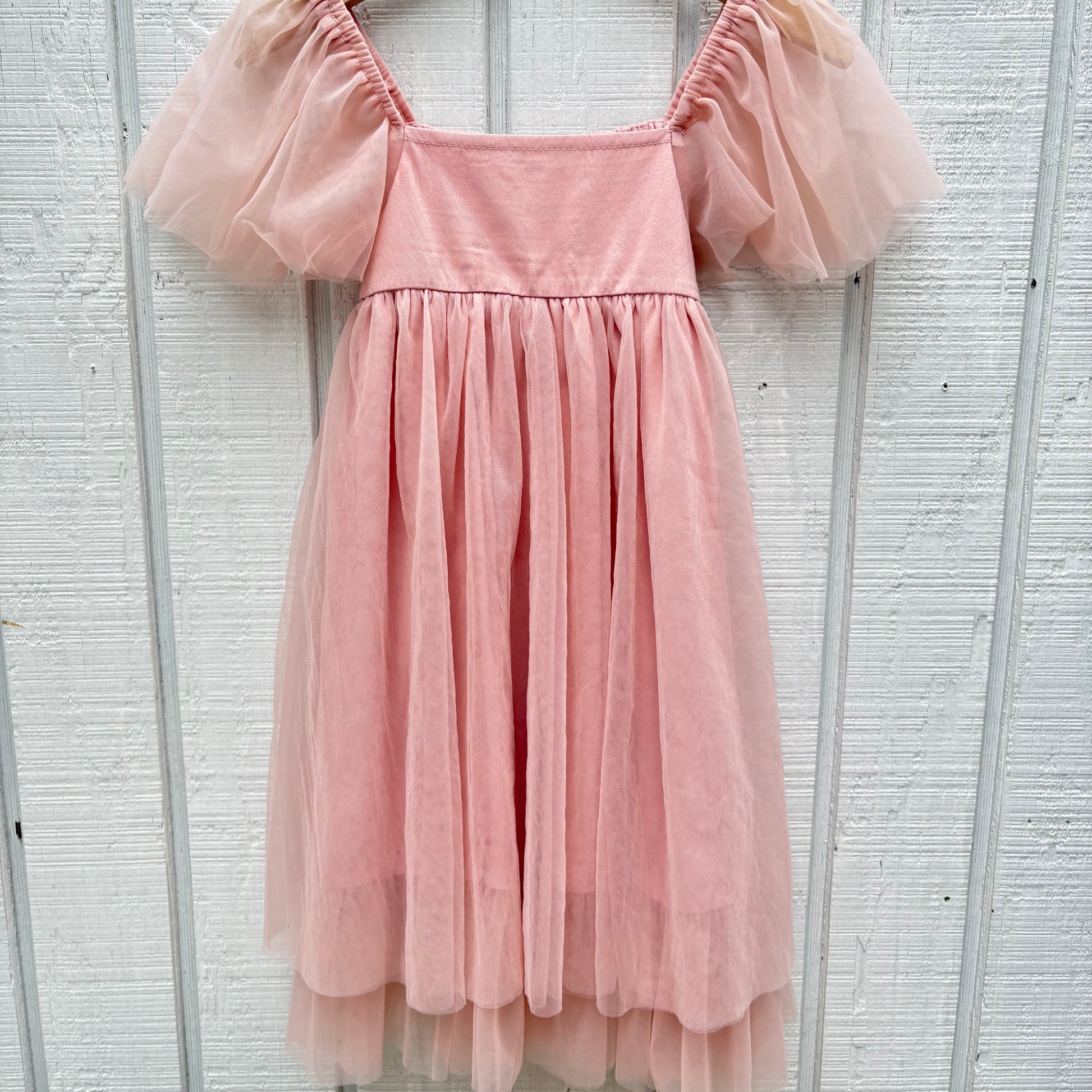 girl's pink dress with tool skirt and short sleeves