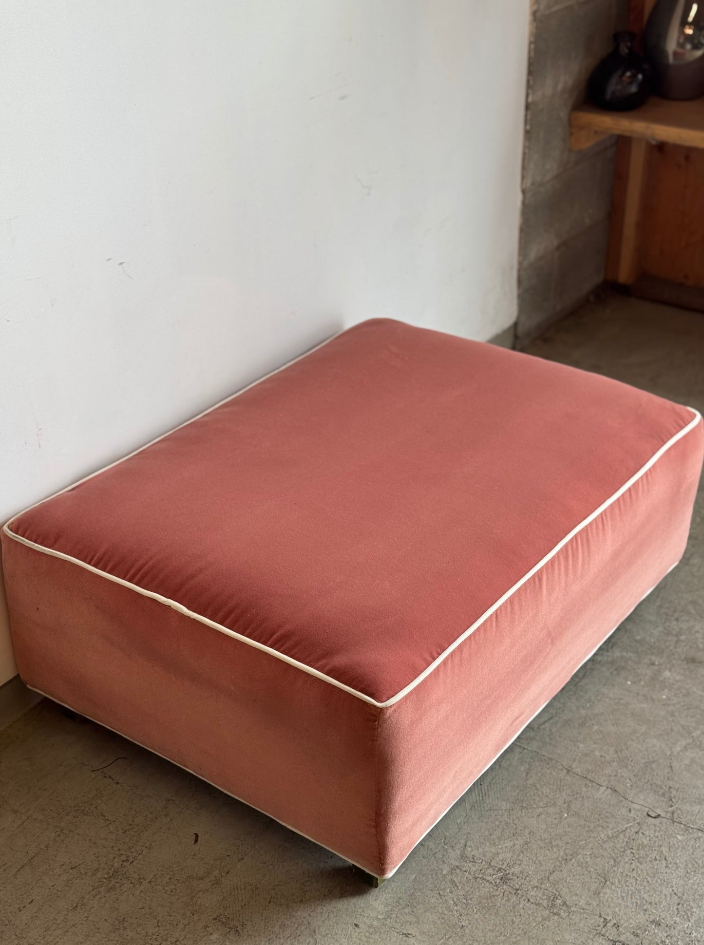 The Saumon Velvet Ottoman
