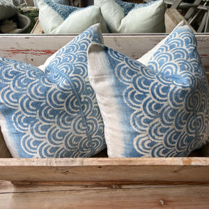 sky blue and white wave like patterned pillow