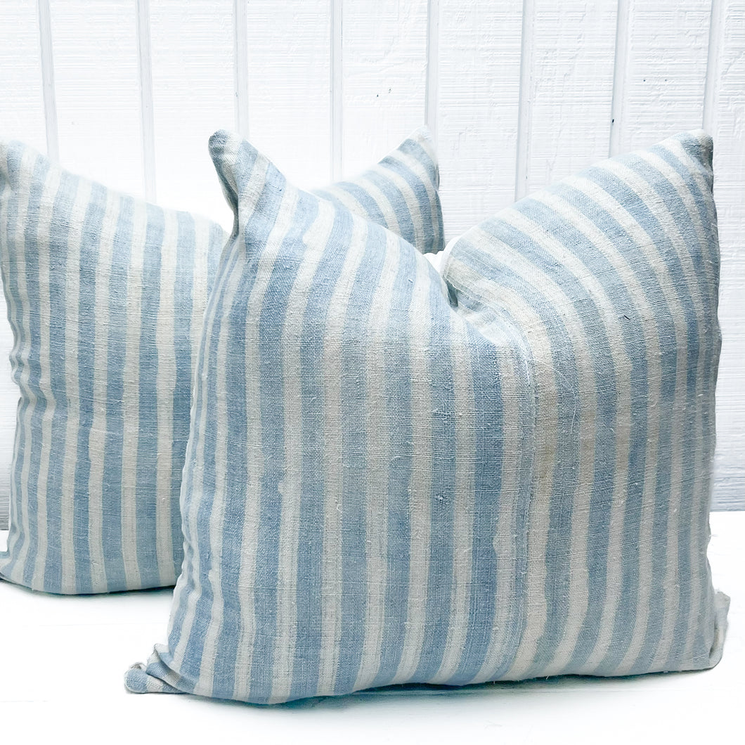 sky blue and white vertical striped pillow