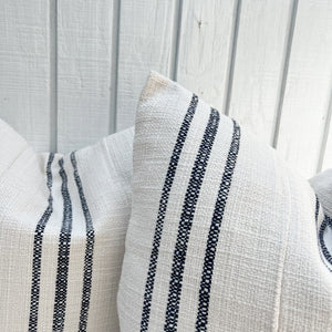 off white grain sack fabric pillow with navy vertical stripes