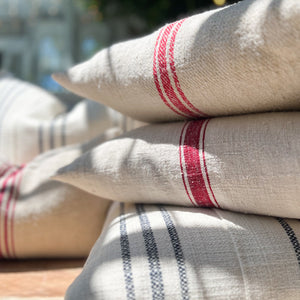 group of grain sack fabric pillows