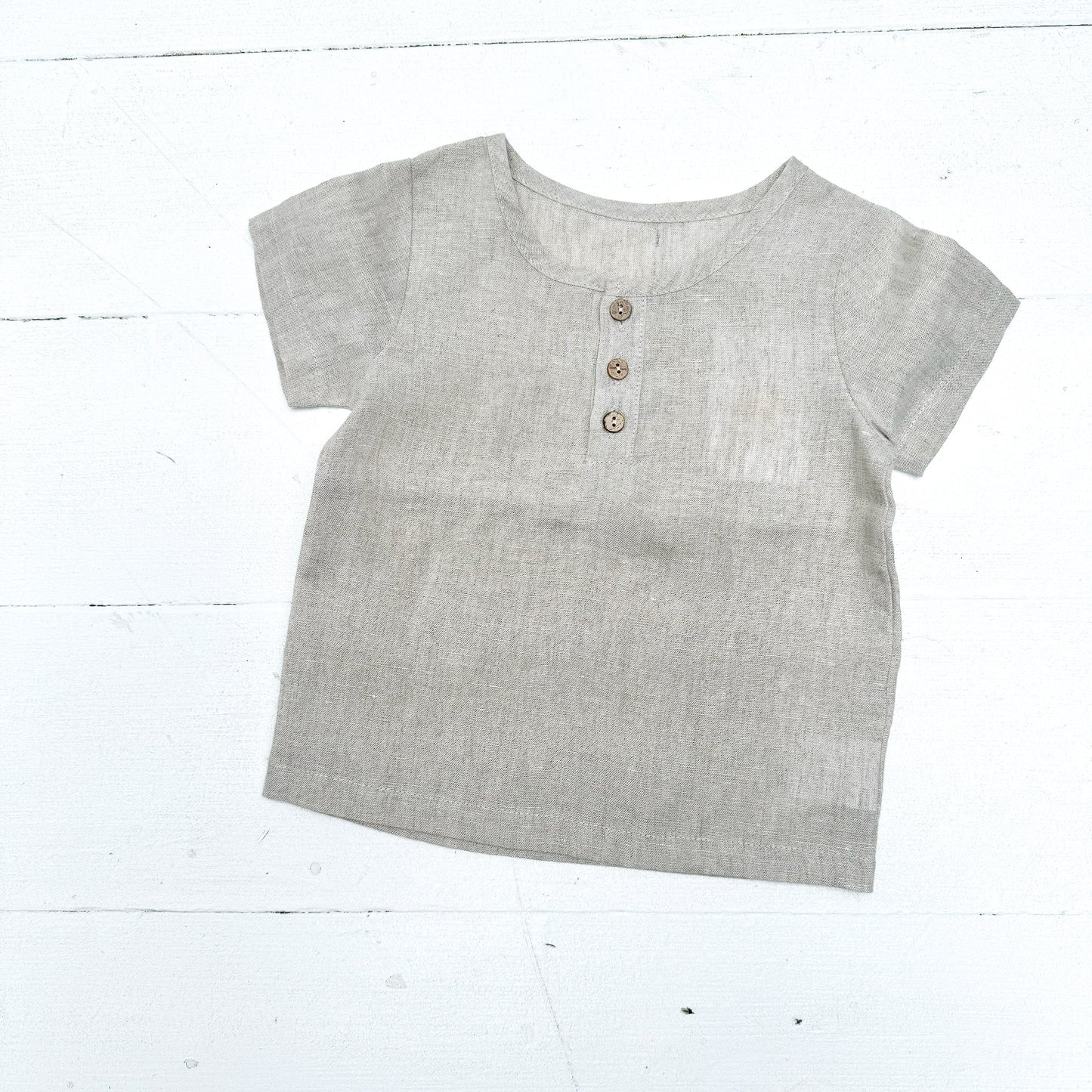 natural colored kid's linen shirt with three buttons