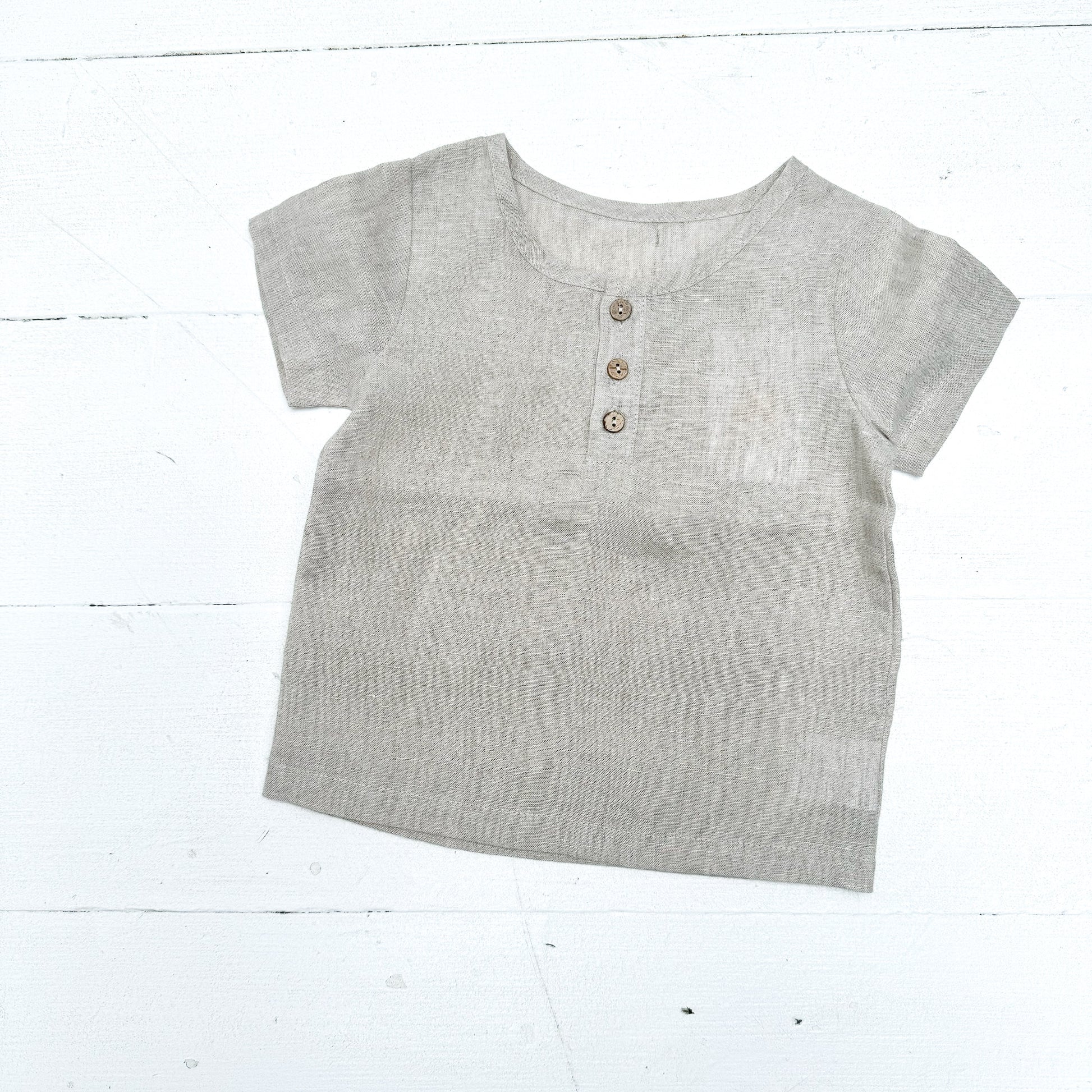 natural colored kid's linen shirt with three buttons