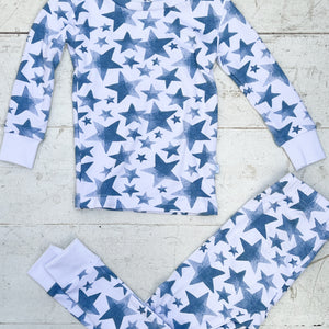 white kid's pajama set with blue stars