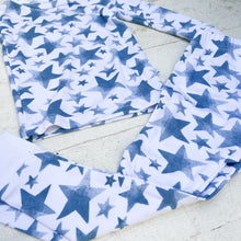 Load image into Gallery viewer, white kid&#39;s pajama set with blue stars