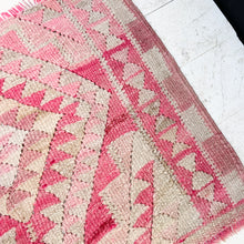 Load image into Gallery viewer, small area rug with geometric type patterns in reds, pinks and off white