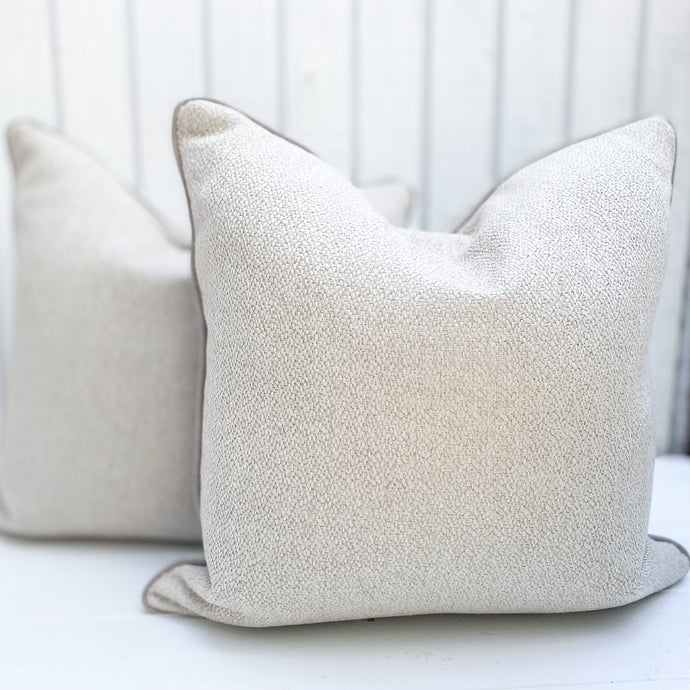 natural colored square pillow with taupe piping