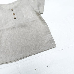 natural colored kid's linen shirt with three buttons