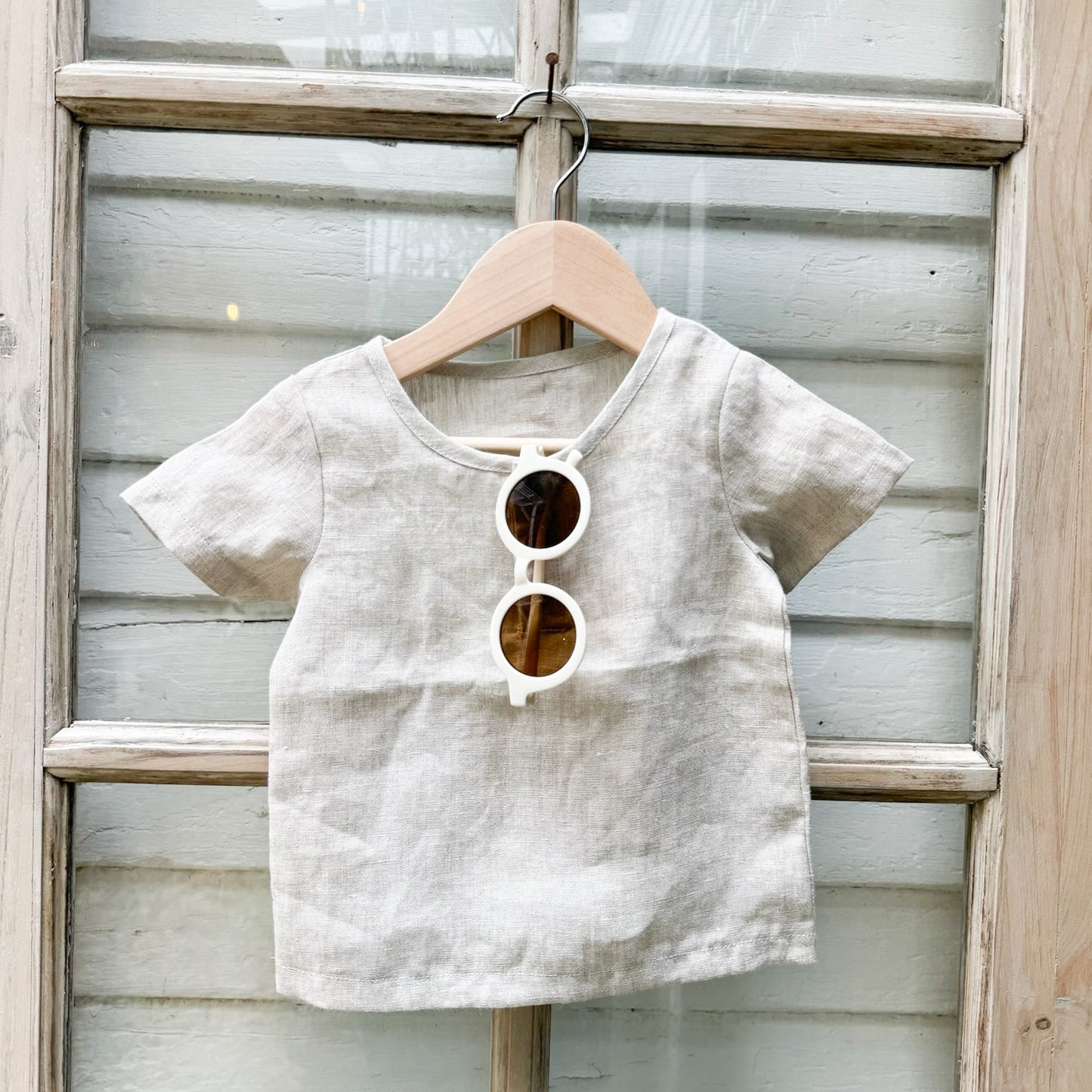 natural colored kid's linen shirt with three buttons