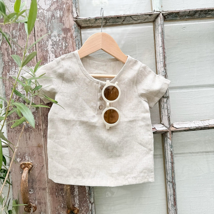 natural colored kid's linen shirt with three buttons