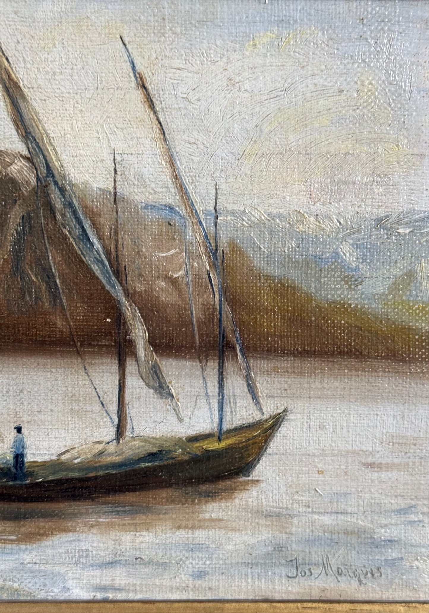 Painting of a sailboat on water with a mountainous background