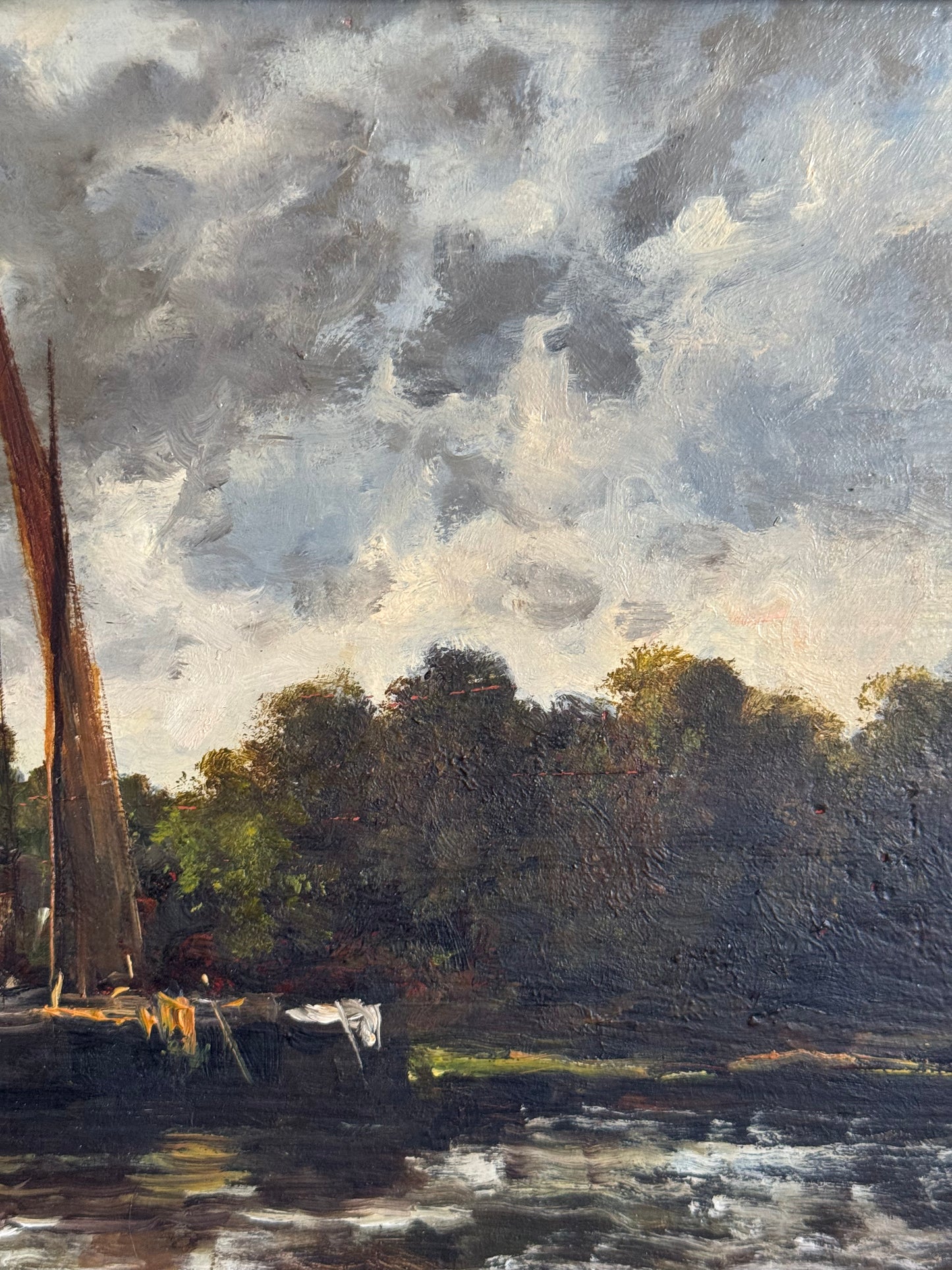 Painting of a landscape with trees and water, featuring a cloudy sky.