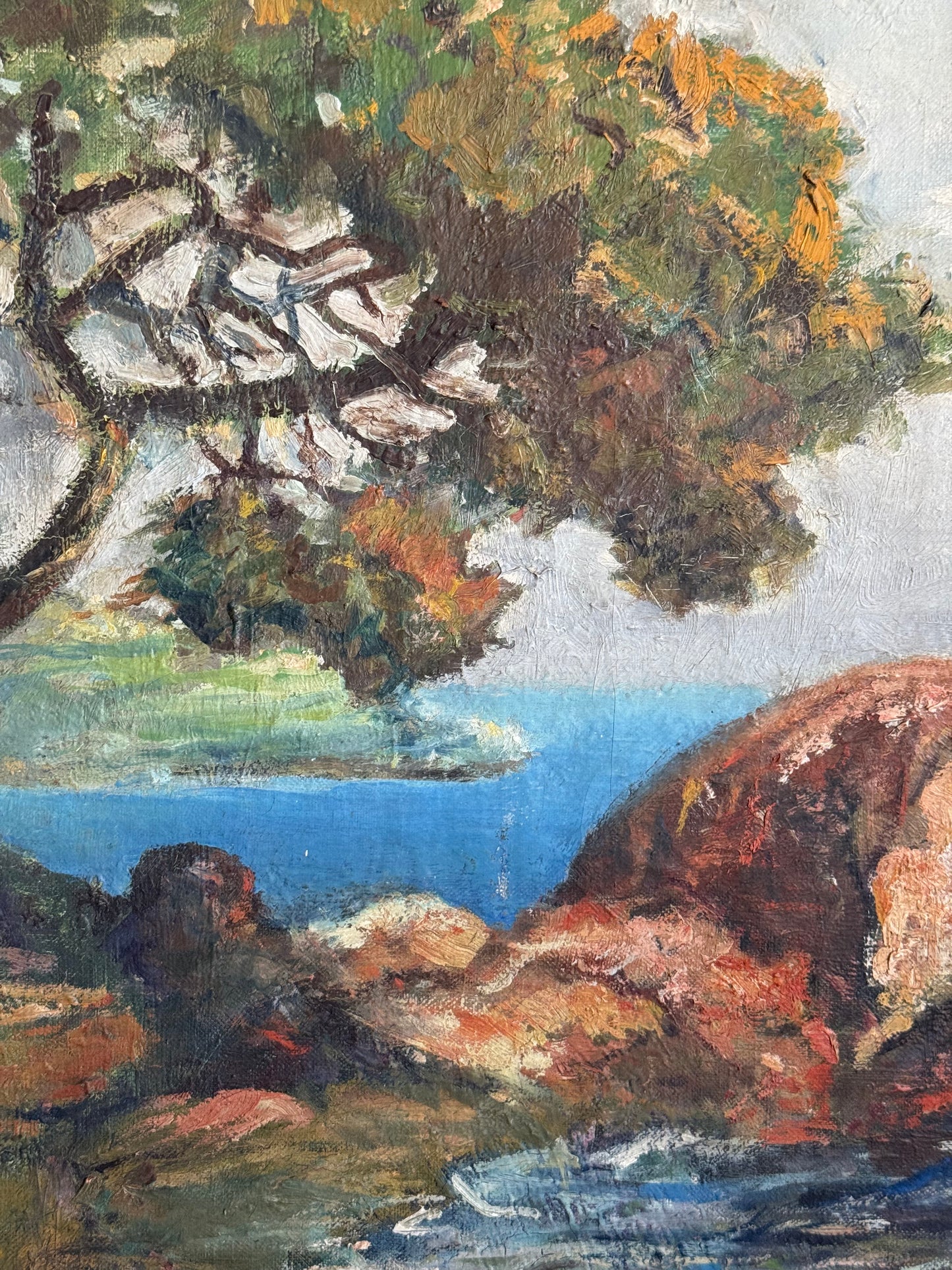 Artistic depiction of a landscape with trees and cliffs.