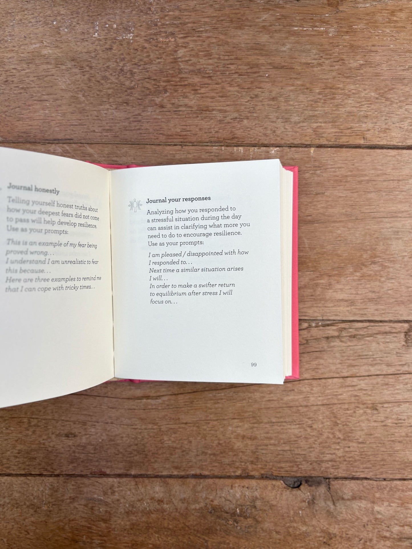 Open book on a wooden surface