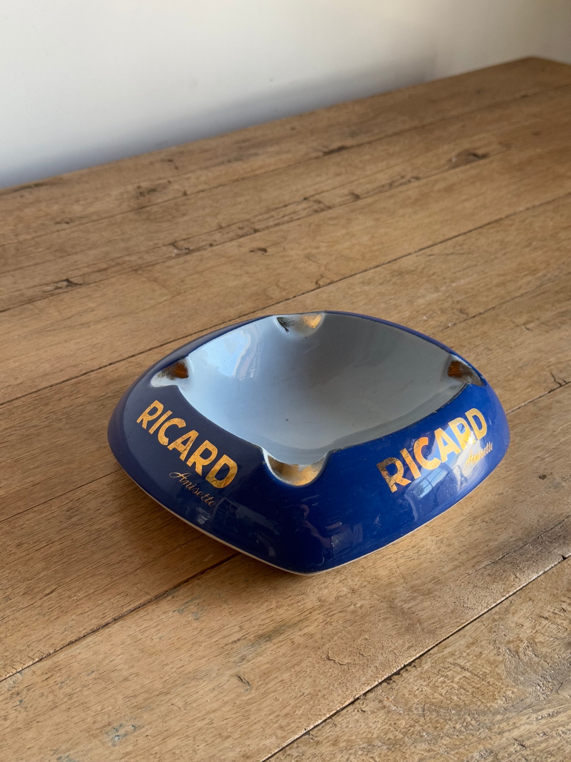 Ricard catch all dish on a wooden surface