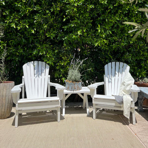 white painted Adirondack chairs