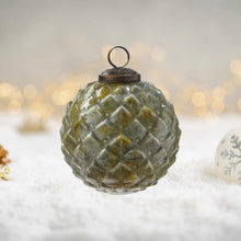 Load image into Gallery viewer, Decorative glass ball ornament with textured surface on a blurred background