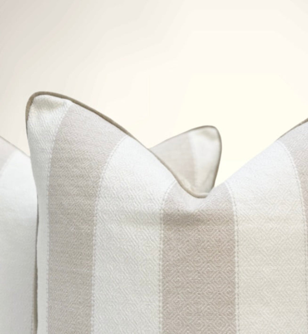 Close-up of a textured white pillow on a light background