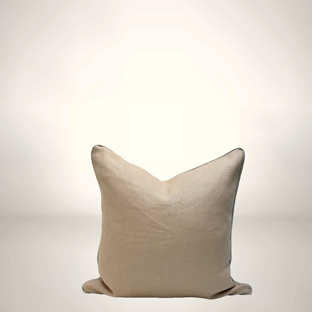 Beige pillow on a light gray background