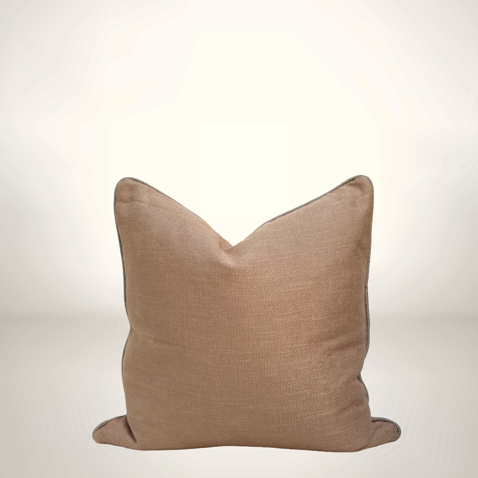 Brown pillow on a light gray background