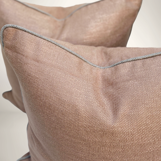 Close-up of a textured brown pillow with a white background