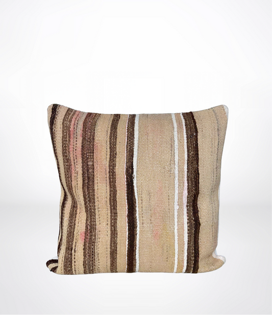 A square throw pillow with a vertical striped pattern in beige, brown, and white, set against a plain white background.