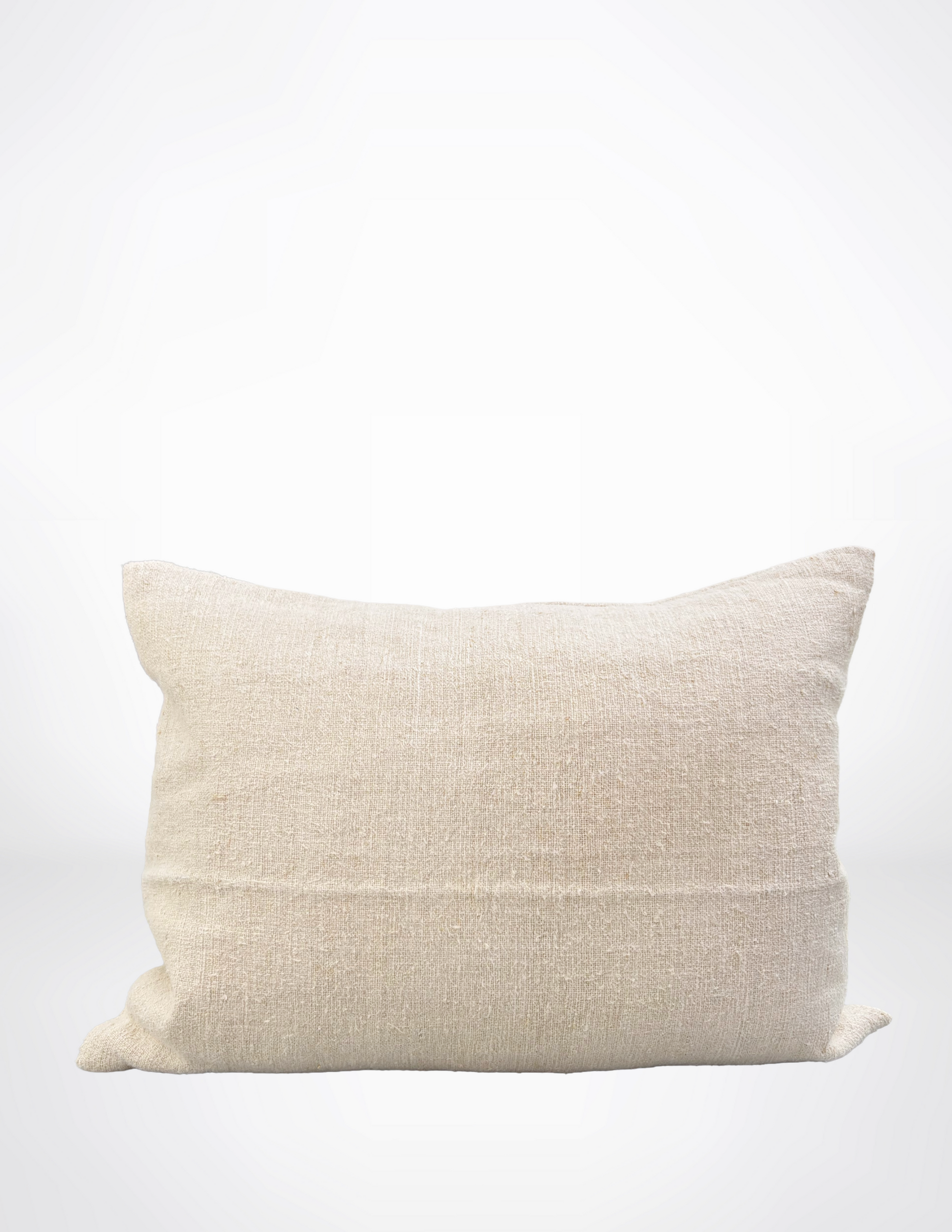 Beige pillow on a white background