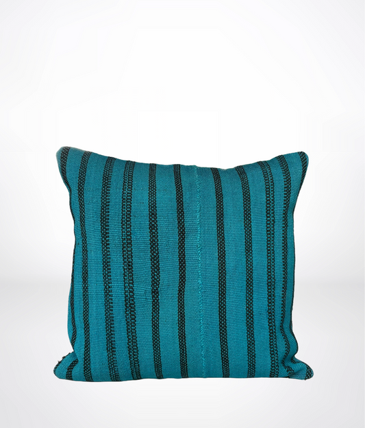 A square throw pillow in teal blue with vertical black textured stripes, photographed against a clean white background.
