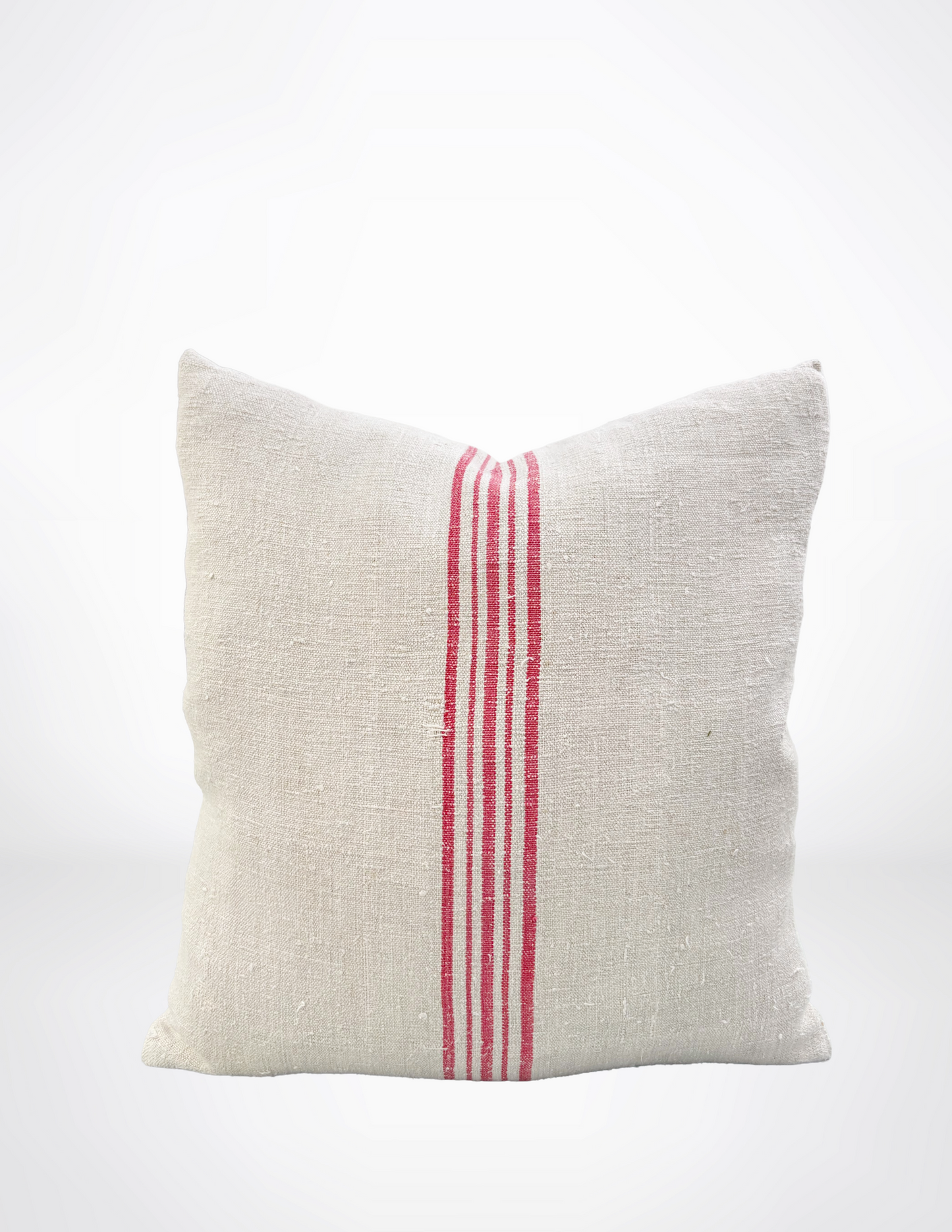 Textured pillow with a red stripe on a white background