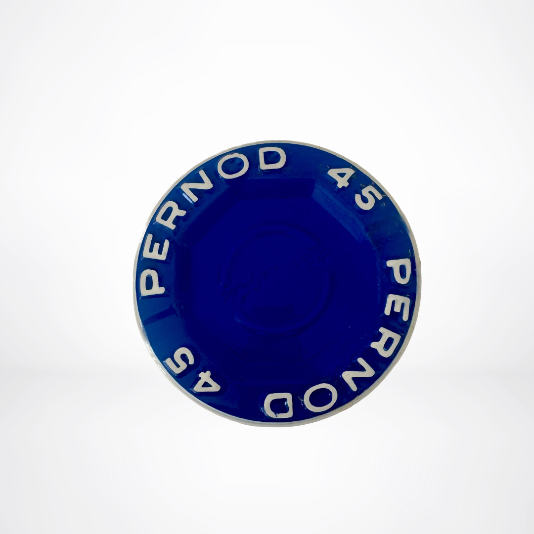 Blue ceramic dish with 'Pernod 45' text on a white background