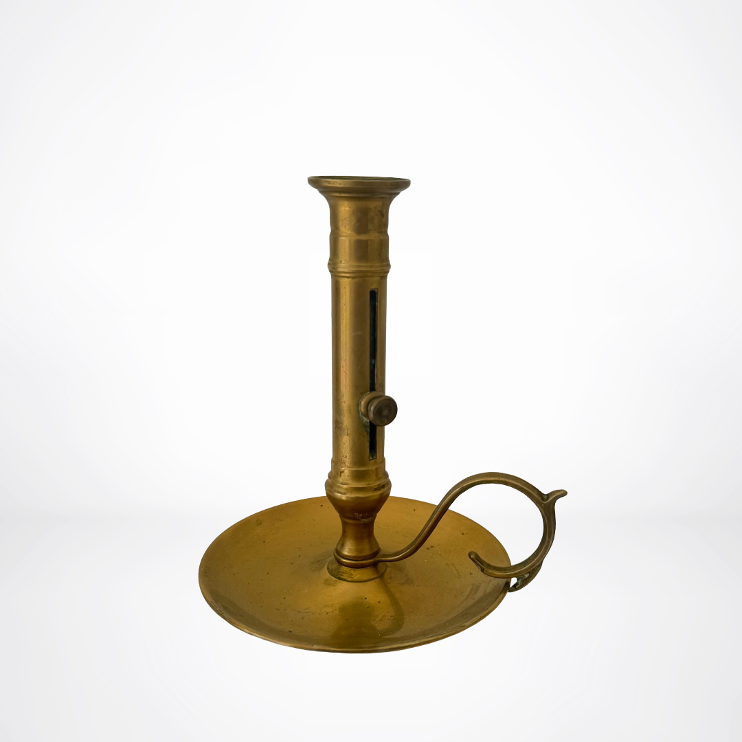 Brass candlestick on a white background