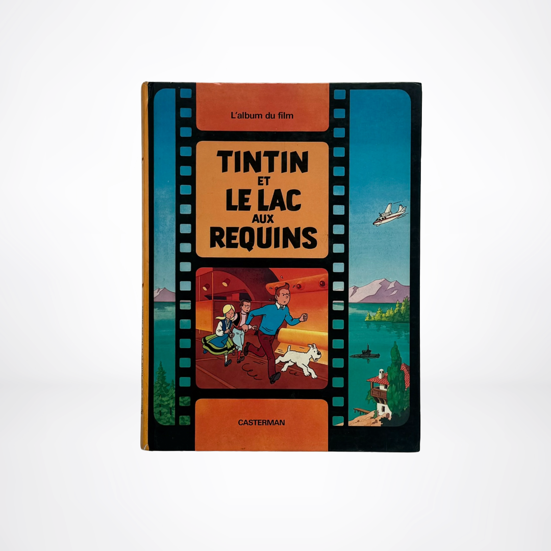 Book cover of 'Tintin et le Lac aux Requins' with colorful design and text.