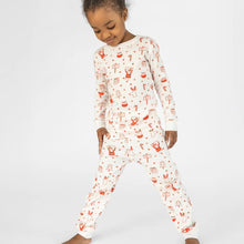 Load image into Gallery viewer, white kid&#39;s pajama set with red Christmas icons