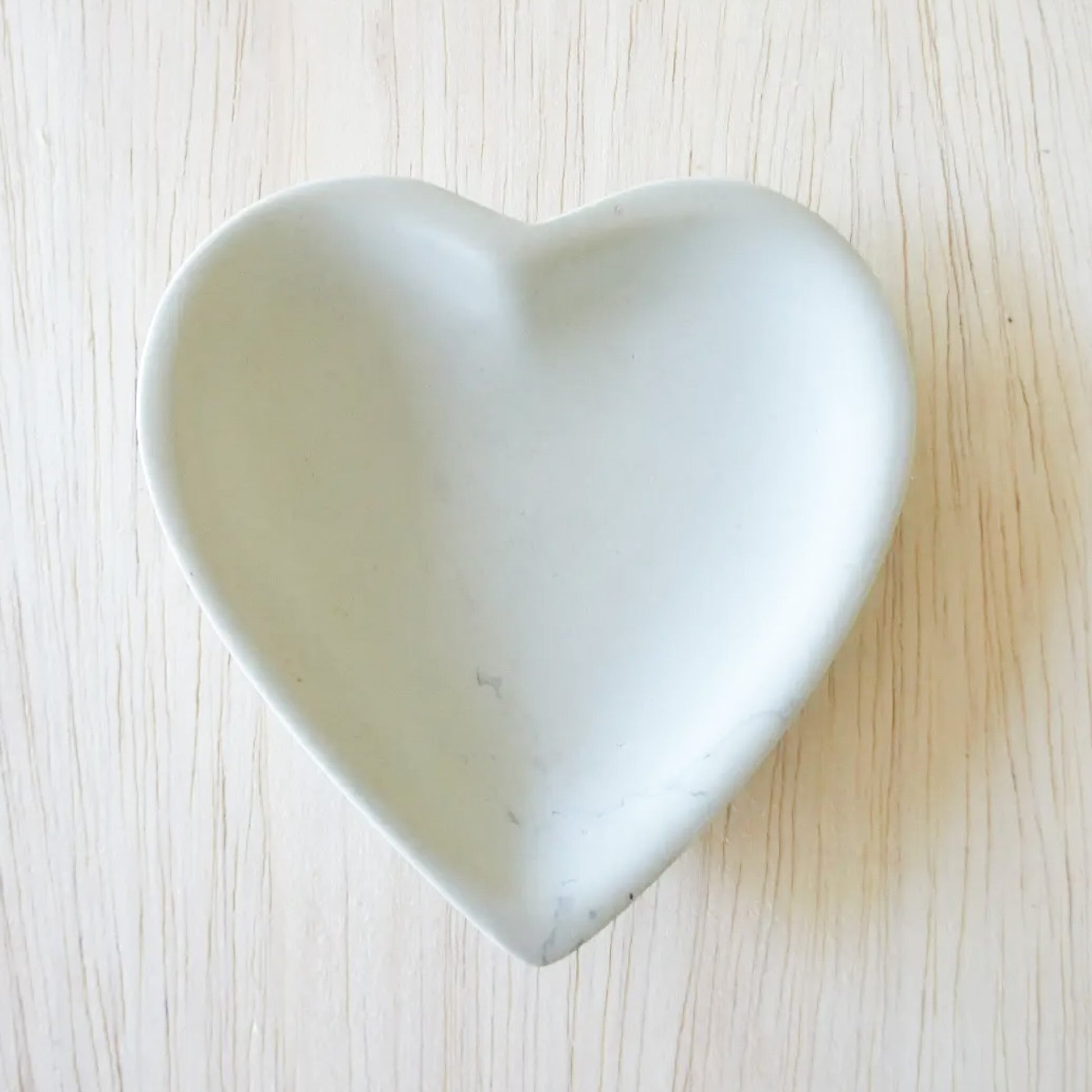 heart shaped white stone bowl