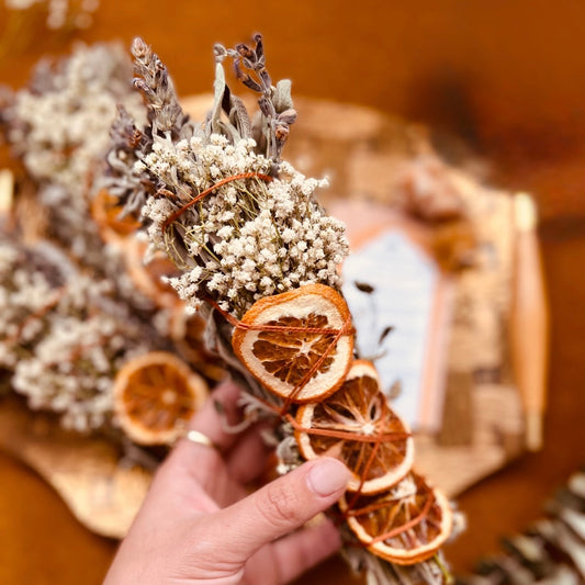 sage bundle with dried oranges and baby's breath